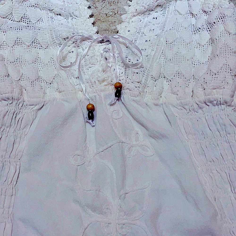 Gorgeous NWT white Peruvian cotton romper with halter tie